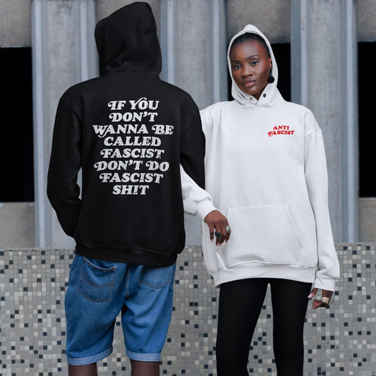 Anti-Fascist Hoodie & Sweatshirt modeled by two individuals; one shows bold anti-fascist text on the back, the other features a subtle front chest print. Ideal for expressing strong, rebellious convictions.