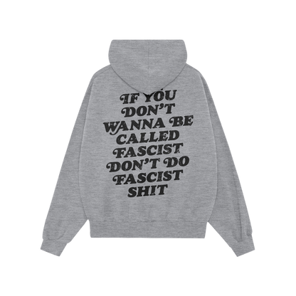 Anti-Fascist Hoodie & Sweatshirt features a bold, distressed message on the back: “If you don’t wanna be called fascist, 