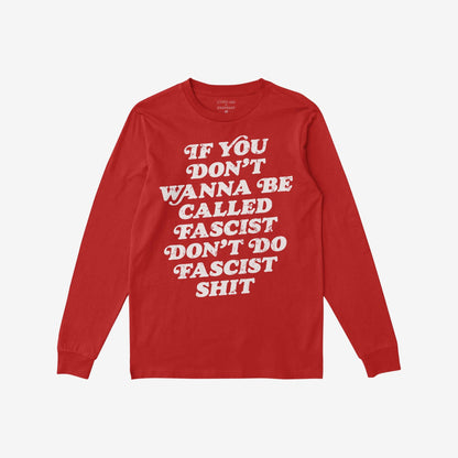 Red long-sleeve Anti-Fascist T-shirt featuring bold, distressed white slogan: “IF YOU DON’T WANNA BE CALLED FASCIST DON’T DO FASCIST SHIT”. Branding EGOPROOF inside collar. Conveys defiance and accountability.