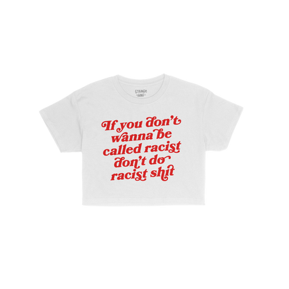 Anti-Racist Women's Baby Tee featuring bold red text, If you don’t wanna be called racist don’t do racist shit, on a whit