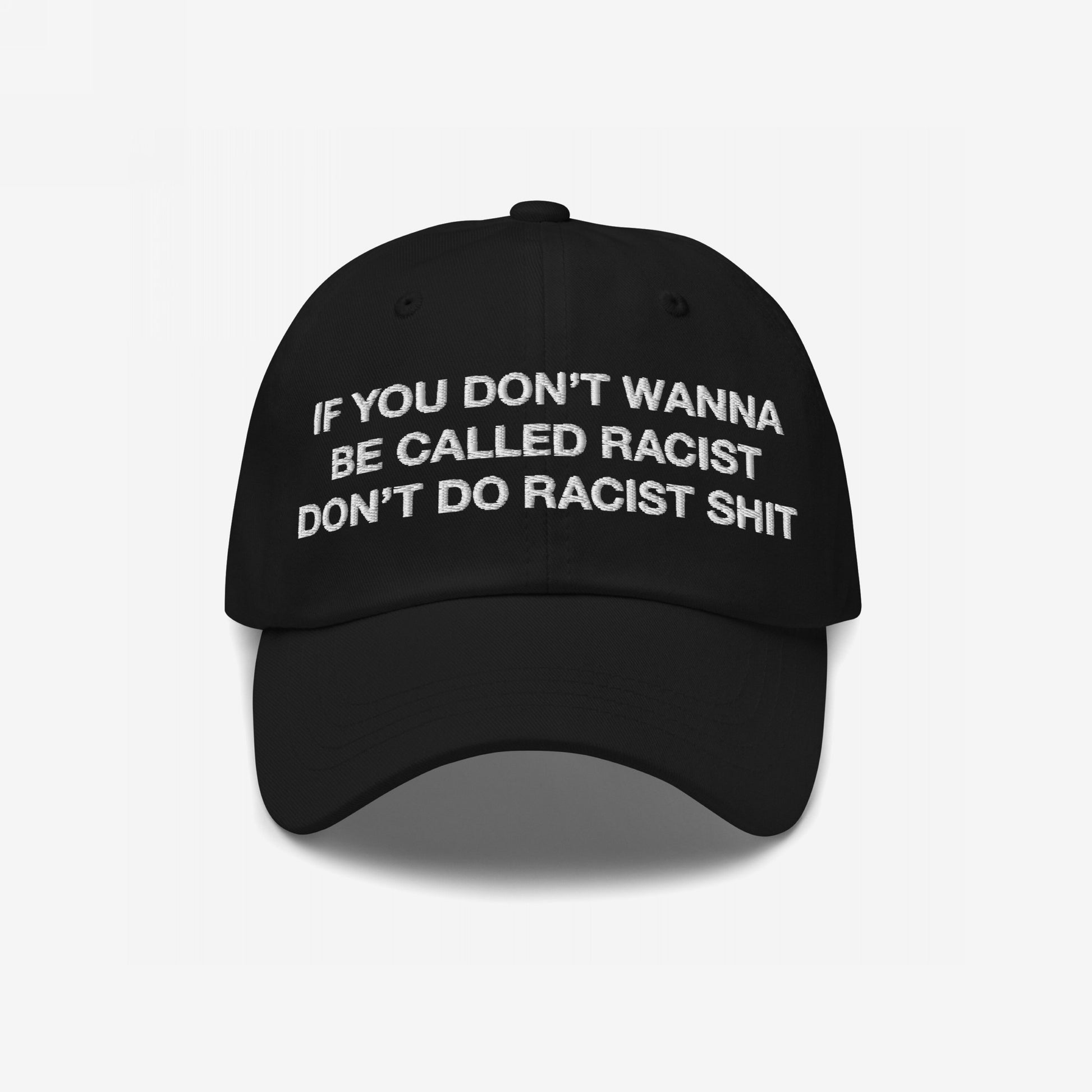 Black Anti-Racist Hat EU with bold, white embroidered text: If you don’t wanna be called racist, don’t do racist shit. A powerful statement piece blending style with purpose.