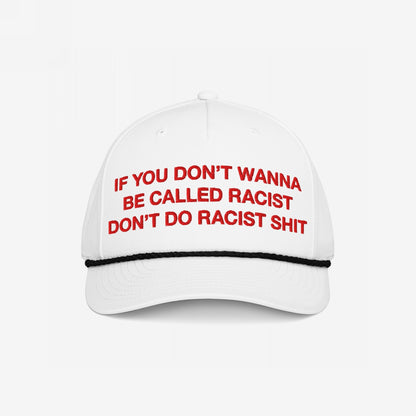 Anti-Racist Hat features bold red embroidery: “IF YOU DON’T WANNA BE CALLED RACIST DON’T DO RACIST SHIT,” on a white cap with black braided cord, reflecting Egoproof's powerful statement ethos.