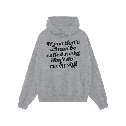 Anti-Racist Hoodie featuring a bold black slogan on the chest, crafted for comfort and impact. Ideal for expressing defiance 