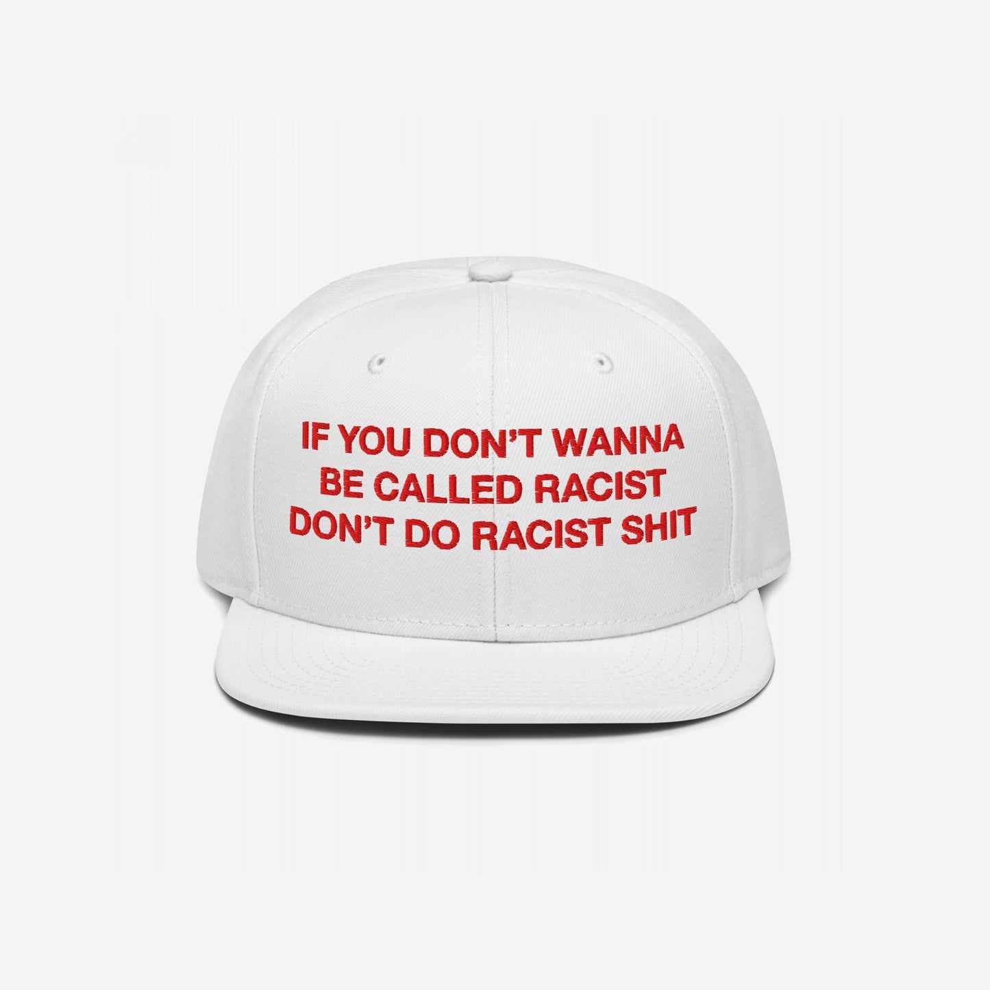 Anti-Racist Hat EU: White flat-brim cap with bold red embroidery stating, IF YOU DON’T WANNA BE CALLED RACIST DON’T DO RACIST SHIT. A strong, stylish statement against racism.