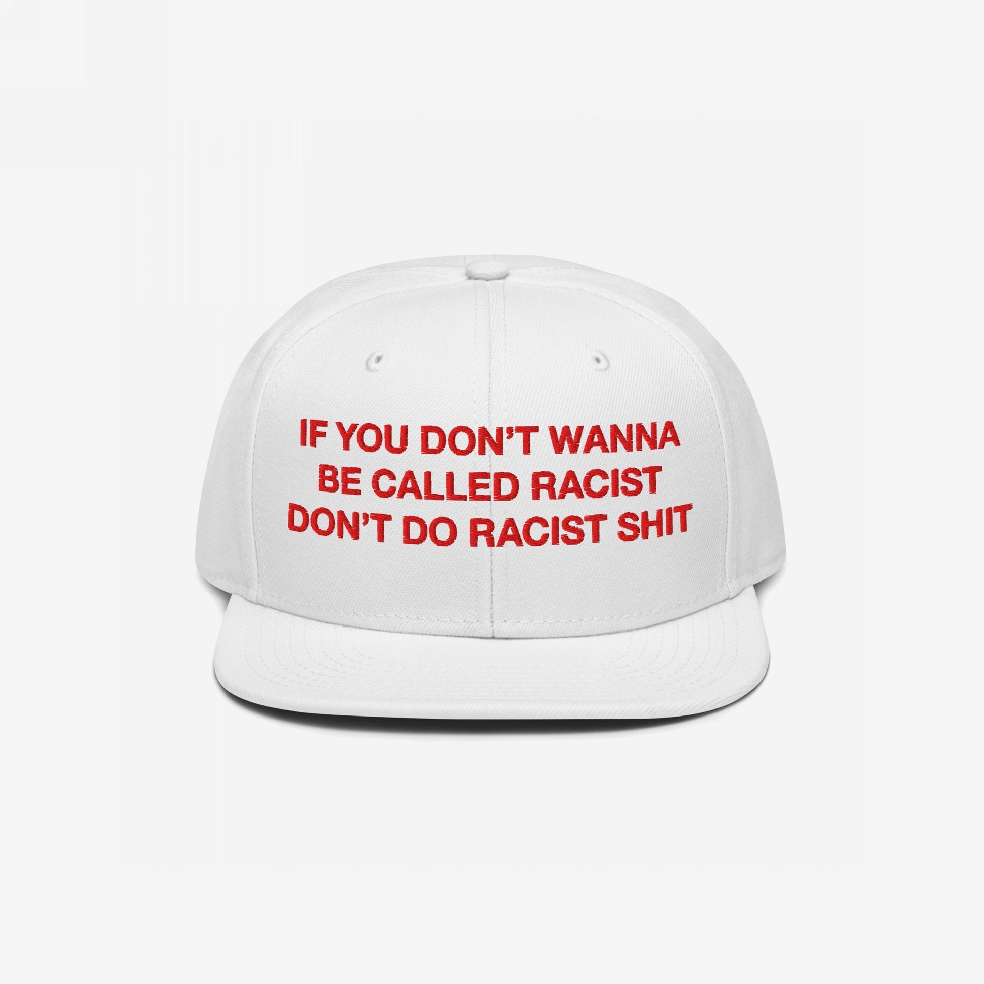 Anti-Racist Hat EU: White flat-brim cap with bold red embroidery stating, IF YOU DON’T WANNA BE CALLED RACIST DON’T DO RACIST SHIT. A strong, stylish statement against racism.