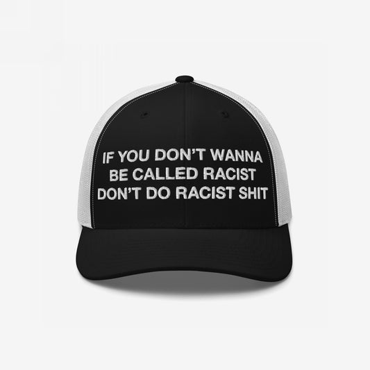 Anti-Racist Hat EU featuring a bold slogan in white block letters on a trucker-style cap, crafted for those confronting racism with style and conviction, reflecting Egoproof's powerful statement ethos.