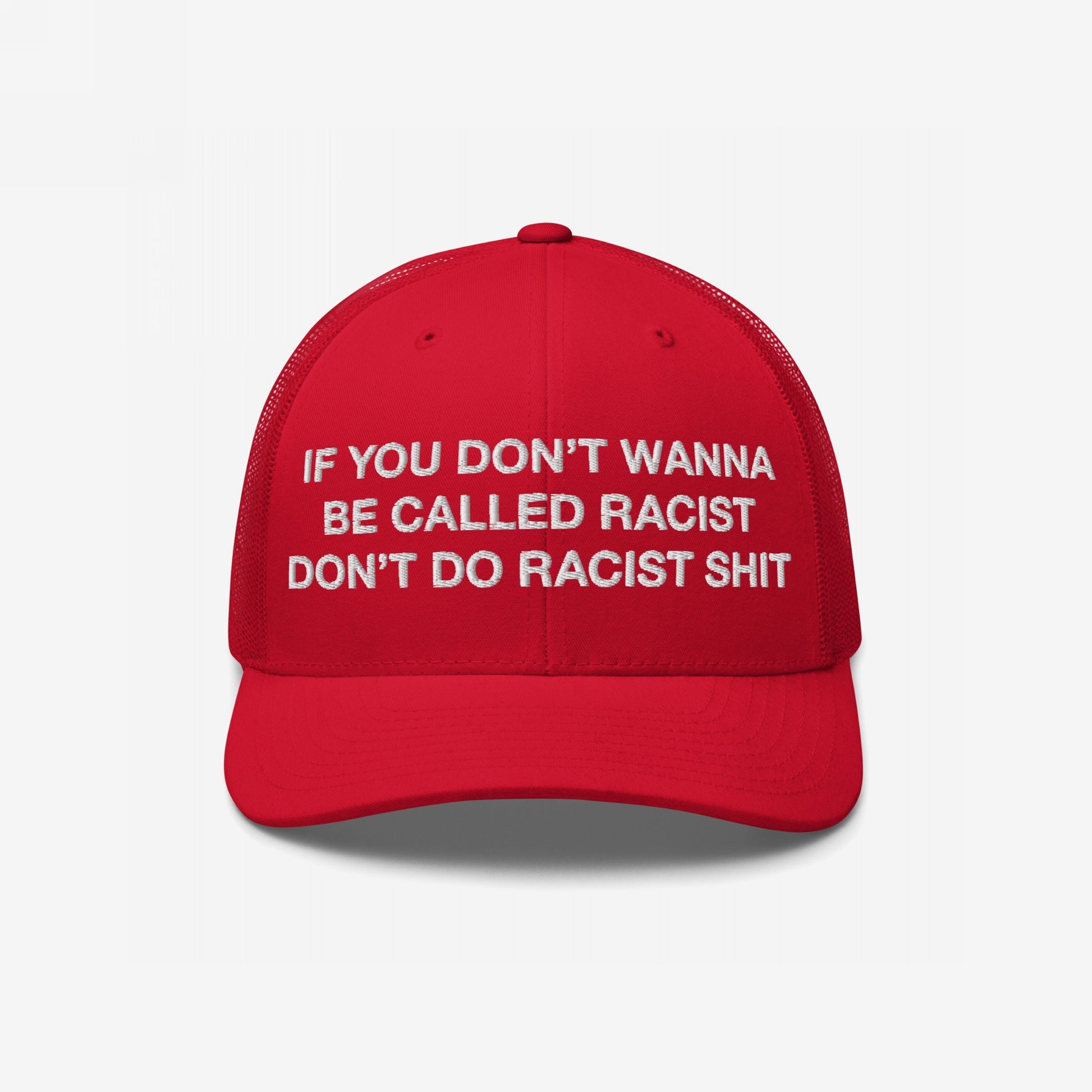 Red trucker-style baseball cap titled Anti-Racist Hat EU, featuring bold, white embroidered text advocating against racism. Designed for those unafraid to make powerful statements, embodying Egoproof's ethos of impactful, everyday apparel.