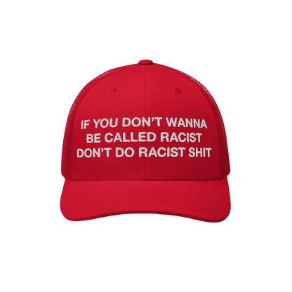 Red trucker-style baseball cap titled Anti-Racist Hat EU, featuring bold, white embroidered text advocating against racism. D