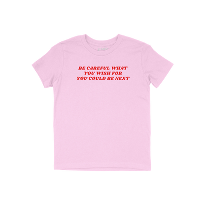 Be Careful Kids T-shirt in pink with bold red text "Be Careful What You Wish For You Could Be Next" empowering young activist