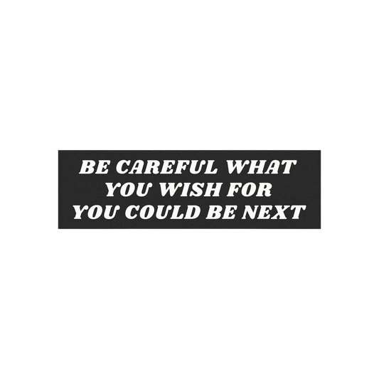 Be Careful Sticker & Magnet features bold white text on a black rectangular background, declaring BE CAREFUL WHAT YOU WISH FO