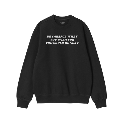 Black crewneck sweatshirt with bold white text warning message on chest, part of the Be Careful Hoodie & Sweatshirt collectio