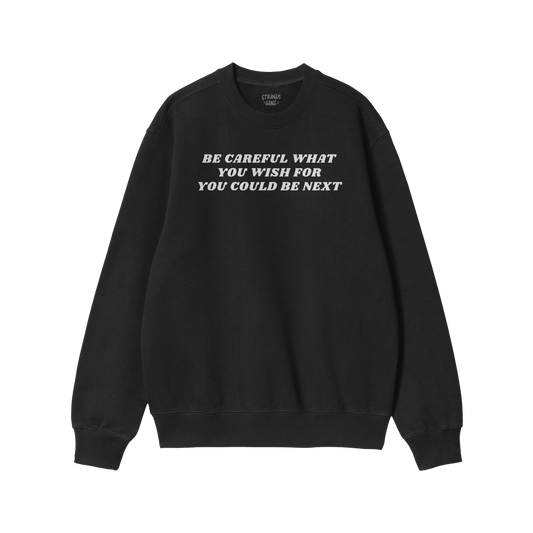 Black crewneck sweatshirt with bold white text warning message on chest, part of the Be Careful Hoodie & Sweatshirt collectio