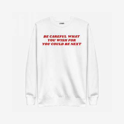 Be Careful Sweatshirt EU features a white crewneck, bold red lettering warning on the chest. Crafted for activists and truth-tellers, it's a wearable statement against injustice, supporting ACLU.