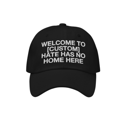 Custom Hate Has No Home Here Dad Hat in black with bold embroidered message promoting love and inclusion on a classic adjusta