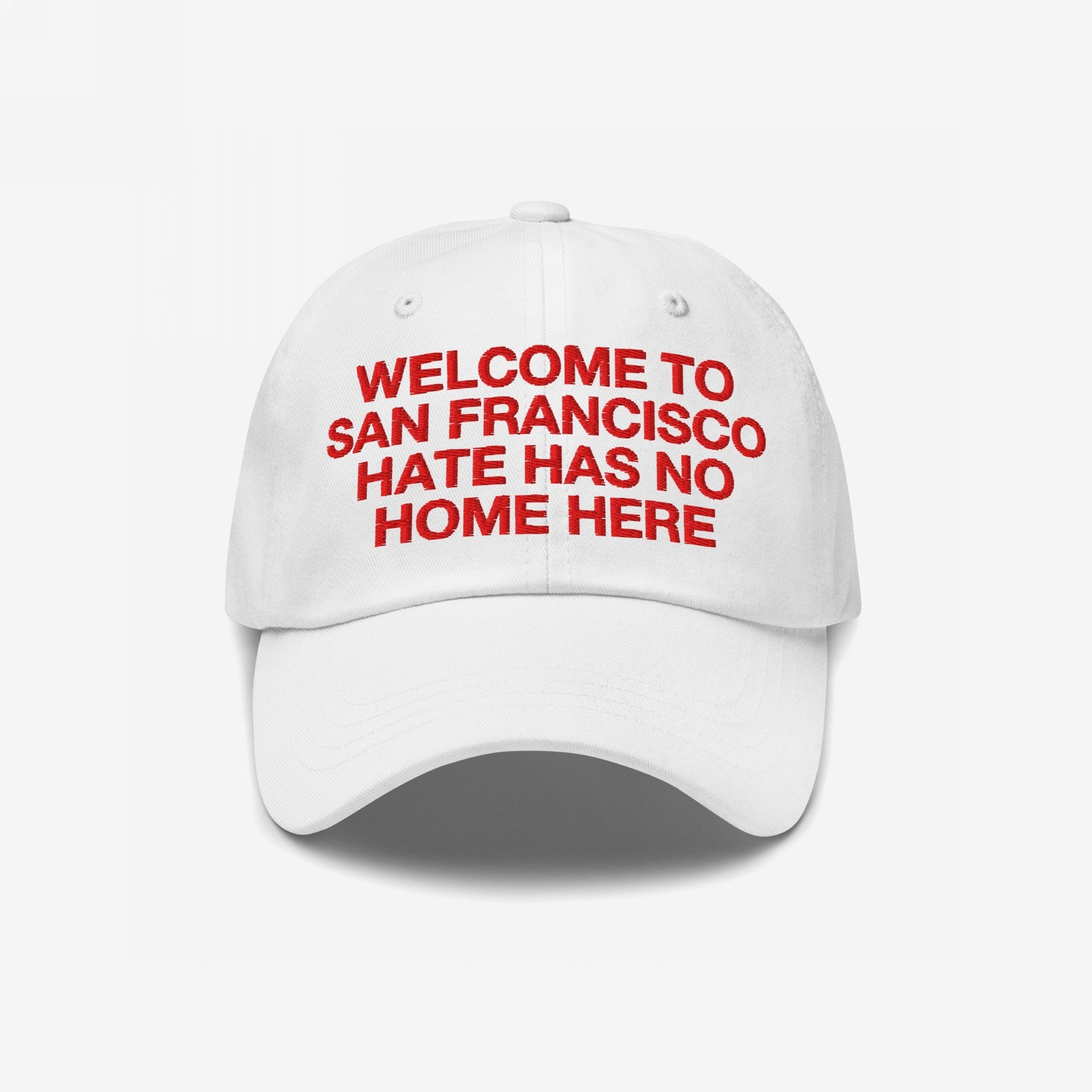 White Custom Hate Has No Home Here Dad Hat with bold red embroidered text promoting love and acceptance in a classic dad hat style