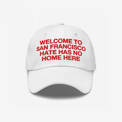 White Custom Hate Has No Home Here Dad Hat with bold red embroidered text promoting love and acceptance in a classic dad hat style