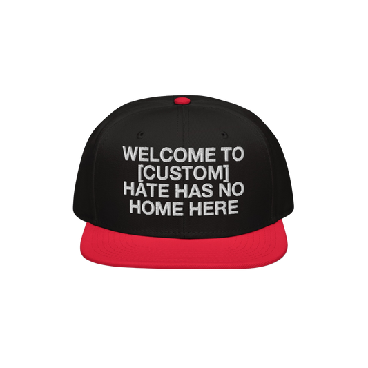 Custom Hate Has No Home Here Snapback Hat with black crown, red flat bill, and bold white embroidery promoting inclusivity an