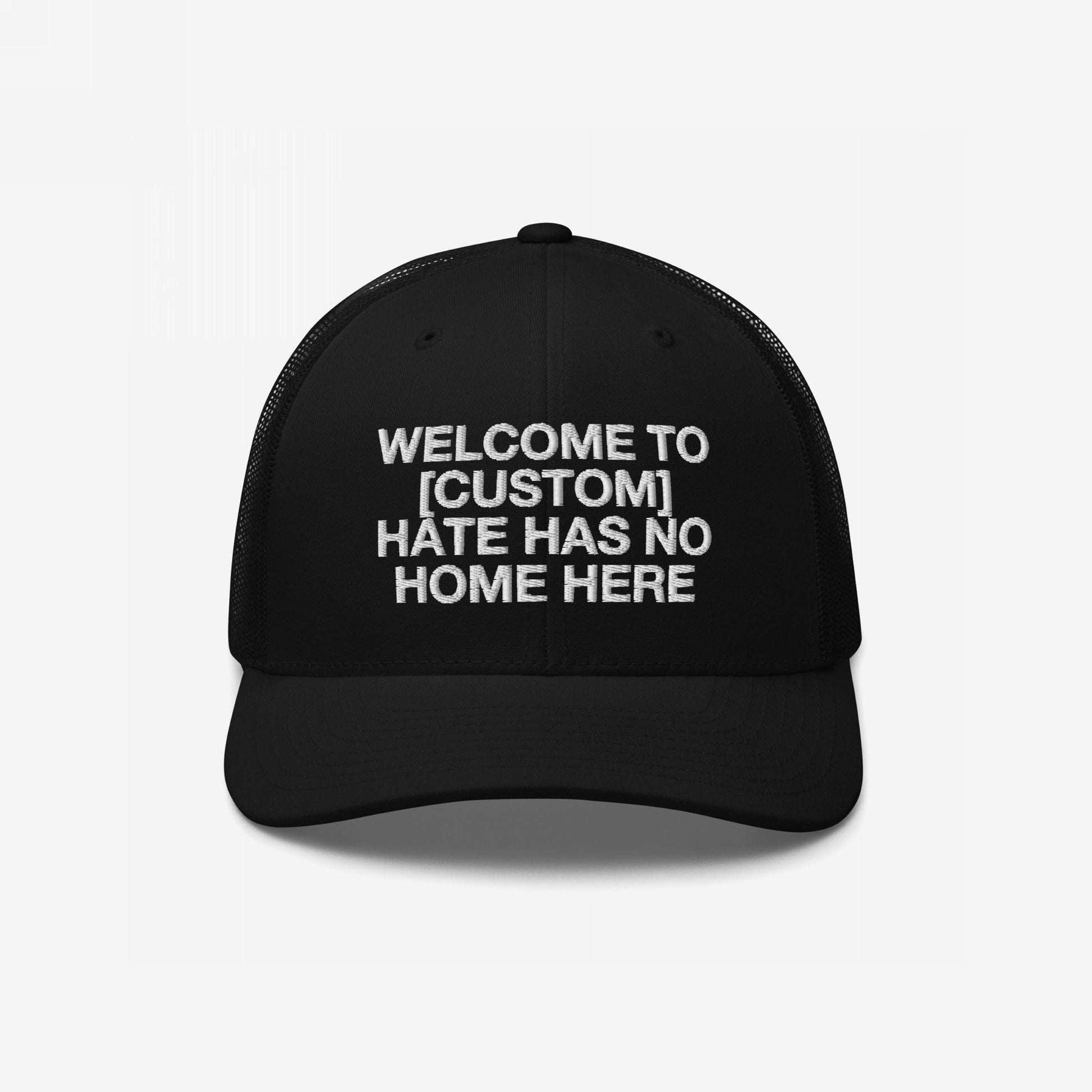 Black Custom Hate Has No Home Here Trucker Hat with white embroidered customizable welcome message and mesh back panel design
