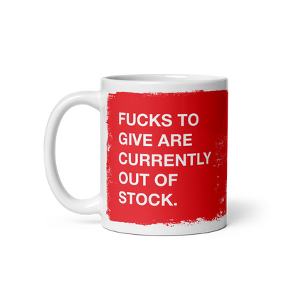 Fucks To Give Mug features a bold red paint-swatch with the phrase “FUCKS TO GIVE ARE CURRENTLY OUT OF STOCK” in white le