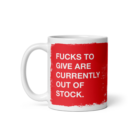 Fucks To Give Mug features a bold red paint-swatch with the phrase “FUCKS TO GIVE ARE CURRENTLY OUT OF STOCK” in white le