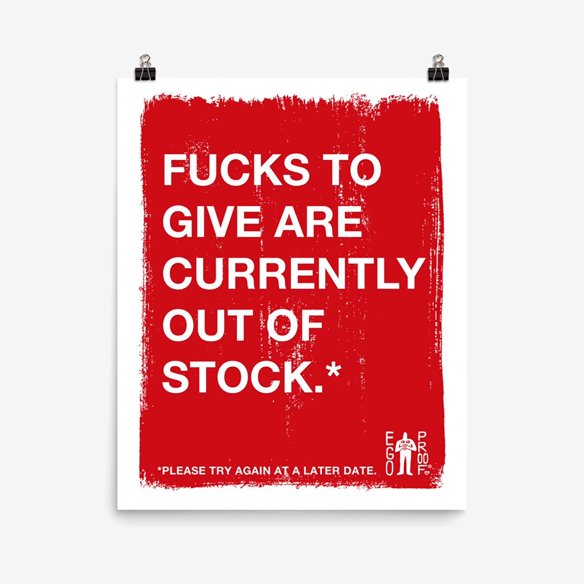 Fucks To Give Giclée Print: A bold red poster with white text humorously stating, Fucks to give are currently out of stock. Features EGOPROOF logo. Ideal for conveying burnout with sarcasm.