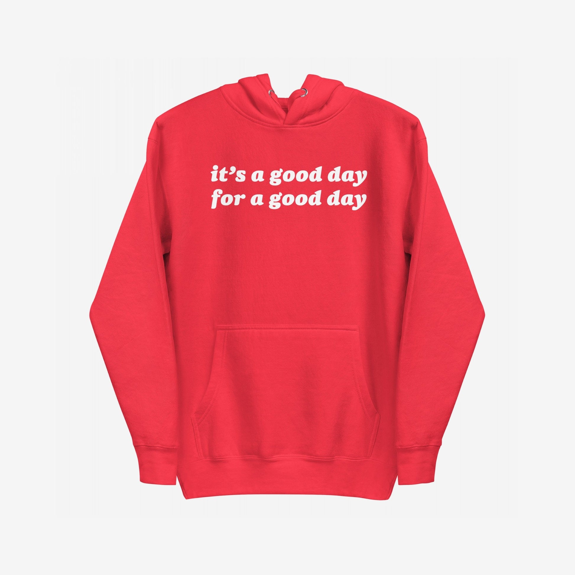 The Good Day Hoodie EU features a red pullover design with a kangaroo pocket, emblazoned with “it’s a good day for a good day” in white, offering comfort and optimism.