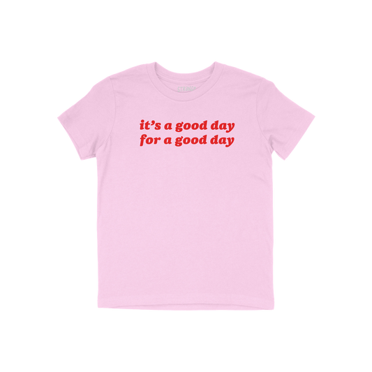 Good Day Kids T-shirt with bold red it’s a good day for a good day slogan, laying flat. Designed to inspire positivity and 