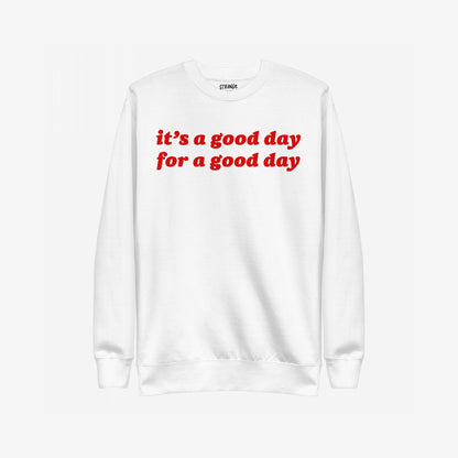 White crewneck sweatshirt titled Good Day Sweatshirt EU features a bold red slogan it’s a good day for a good day, designed for comfort and optimism.