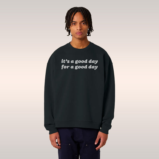 Good Day Hoodie & Sweatshirt in soft pink with red uplifting text, cozy fleece for calm and optimism in casual style.