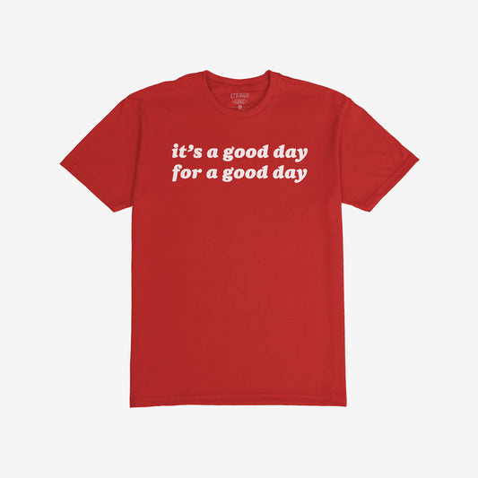 Good Day T-shirt featuring the slogan it’s a good day for a good day in bold white letters, promoting positivity and mental health awareness, laid flat with brand label partially visible.