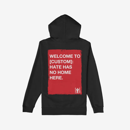 Custom Hate Has No Home Here Hoodie features a bold red rectangle on the back with a powerful anti-hate message, accented by Ego Proof’s logo, promoting unity through personalized location customization.