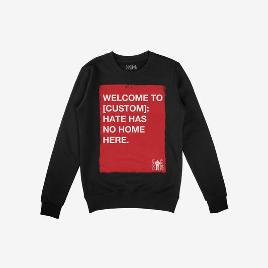Custom Hate Has No Home Here Sweatshirt: Black crewneck with a bold red rectangle displaying an anti-hate message. Features customizable community name and a small EGOPOP logo, embodying resistance and unity.