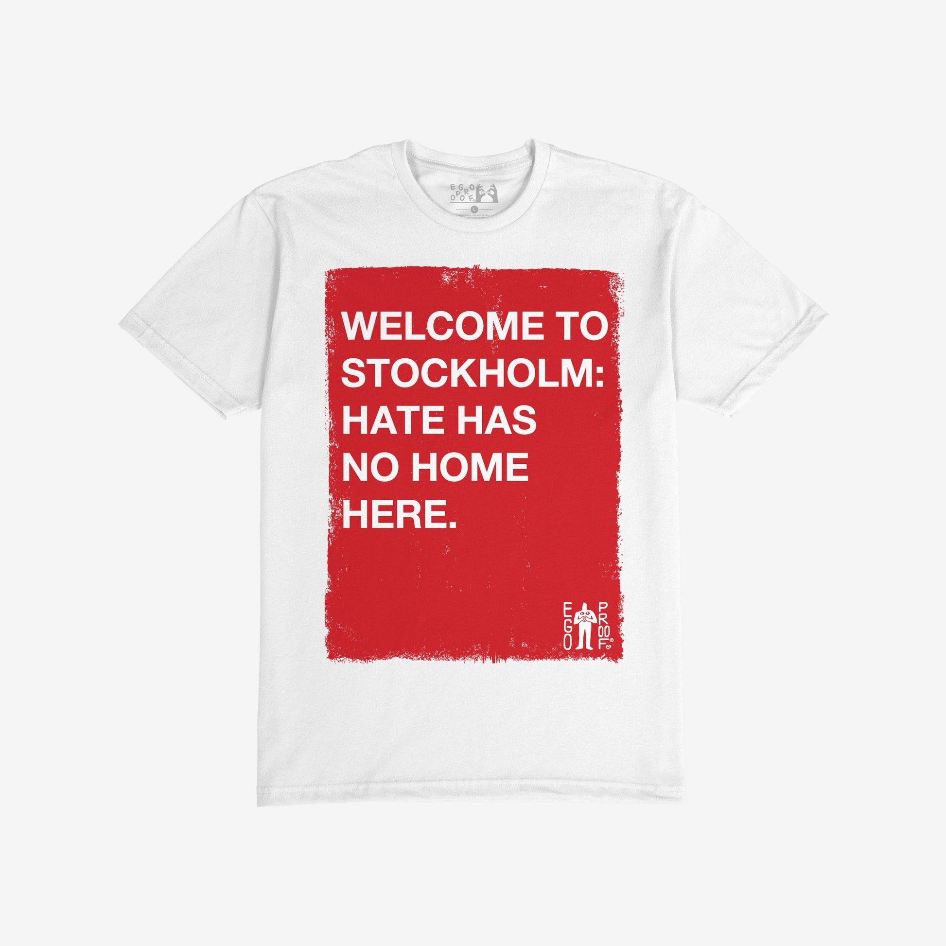 Custom Hate Has No Home Here T-shirt featuring a red rectangle with bold white text, promoting inclusivity. Includes EGO PROD logo. Personalize the location to express community pride and resist discrimination.