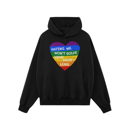 No LGBTQ Hate Hoodie in black with rainbow heart and message "Hating me won't solve your problems" promoting queer visibility