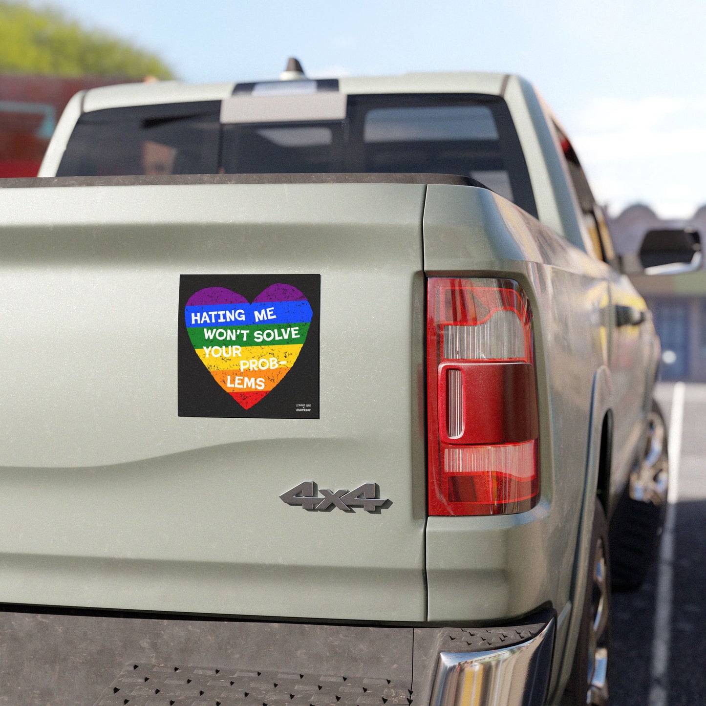 No LGBTQ Hate Sticker & Magnet with rainbow heart and text “Hating Me Won’t Solve Your Problems” on the back of a pickup truck.