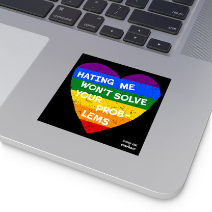 No LGBTQ Hate Sticker & Magnet showing a rainbow heart with "Hating Me Won't Solve Your Problems" phrase on a laptop surface.
