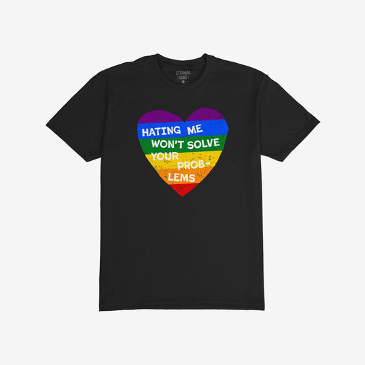No LGBTQ Hate T-shirt with rainbow heart graphic and text Hating Me Won't Solve Your Problems on black background.