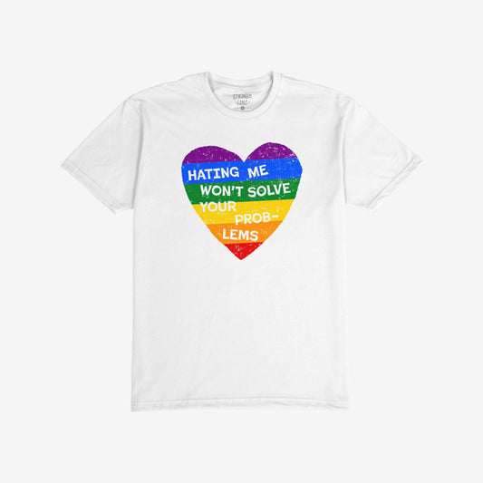 White No LGBTQ Hate T-shirt with a rainbow heart and text "Hating Me Won't Solve Your Problems" promoting LGBTQ+ support.