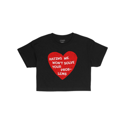 No Hate Women's Baby Tee black cropped shirt with red heart graphic and message Hating Me Won't Solve Your Problems.
