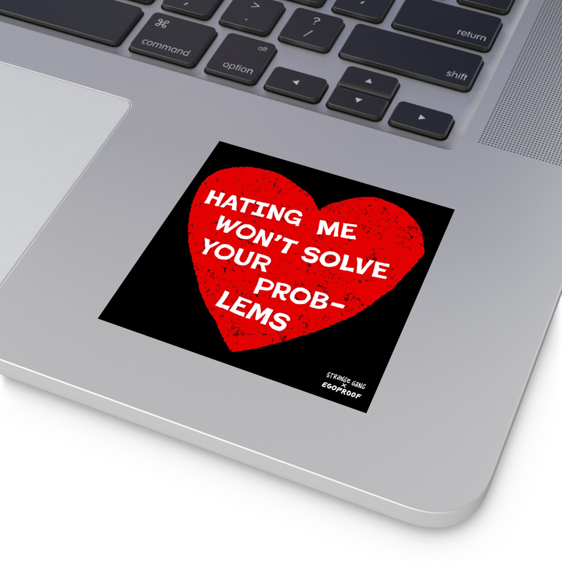 No Hate Sticker & Magnet on laptop with red heart design and message "Hating Me Won't Solve Your Problems" promoting kindness and justice.