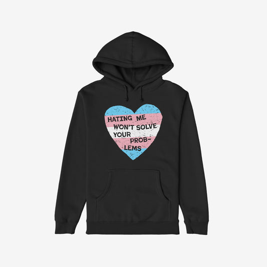 No Trans Hate Hoodie black with trans flag heart and "Hating Me Won't Solve Your Problems" message promoting visibility and support.