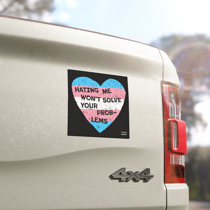 No Trans Hate Sticker & Magnet showing trans flag heart with "Hating Me Won’t Solve Your Problems" on a white 4x4 vehicle.
