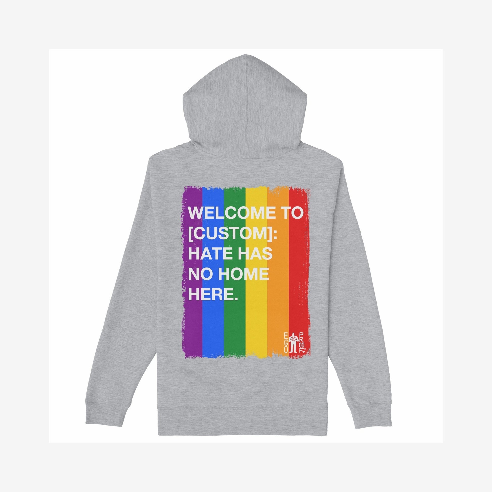 Back view of the Custom Hate Has No Home Here Pride Hoodie with rainbow stripes and bold white slogan. Features customizable city/community name, promoting LGBTQ+ inclusivity. Perfect for expressing pride and acceptance.