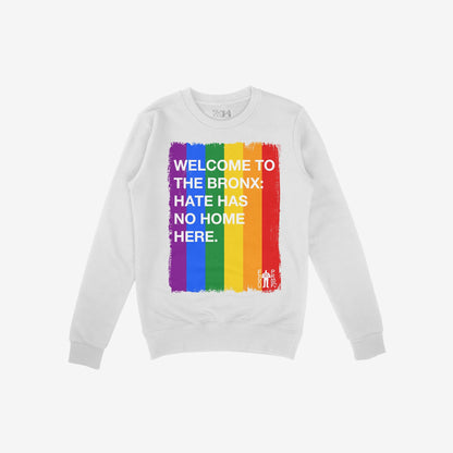 Custom Hate Has No Home Here Pride Sweatshirt featuring vertical rainbow stripes with bold white text promoting inclusivity. Laid flat, it includes a subtle Egoproof logo, reflecting a statement on love and equality.