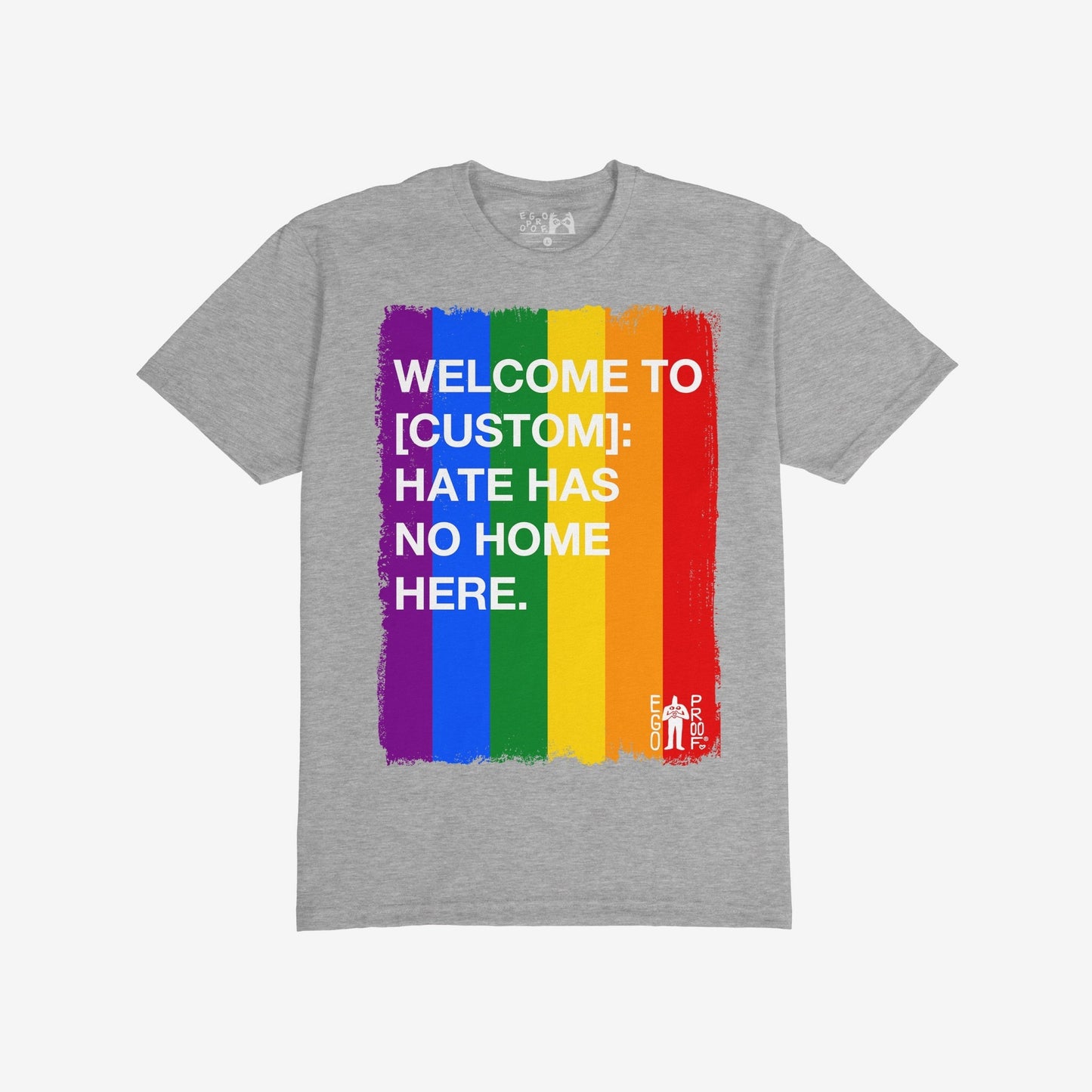 Custom Hate Has No Home Here Pride T-shirt features a brushed rainbow stripe with bold text promoting inclusion. Personalize with your community name to champion unity and acceptance.