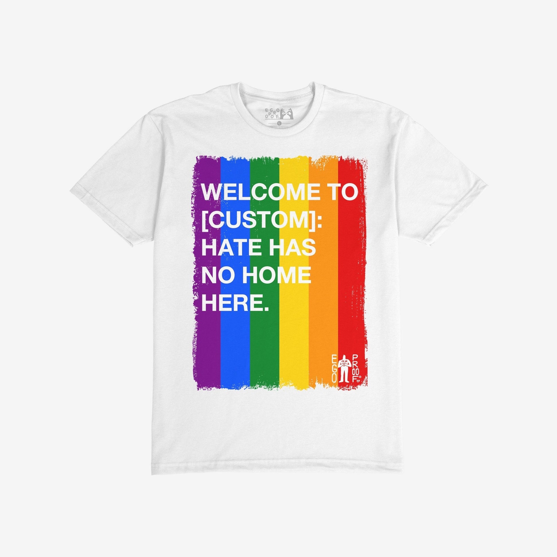 Custom Hate Has No Home Here Pride T-shirt featuring a brushed rainbow-stripe rectangle with bold text, customizable with your city name. Includes “EGOPROOF.” logo, embodying unity and acceptance.