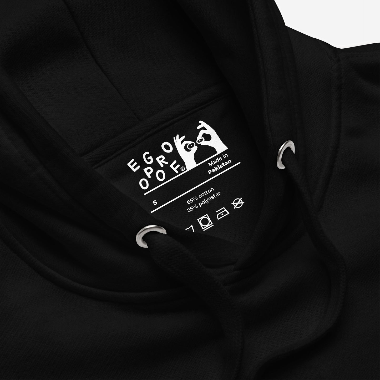 Inside neck view of the Make Art Every Day Hoodie EU, showcasing the EGROPOOF label, care instructions, and hoodie drawcords. Crafted for creators, blending comfort with a bold art-inspired statement.