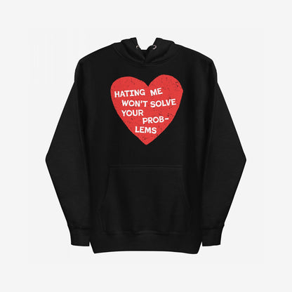 Black No Hate Hoodie EU featuring a front kangaroo pocket and a distressed red heart graphic with the message “Hating Me Won’t Solve Your Problems” boldly displayed on the chest.