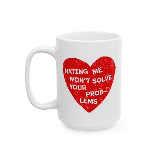 No Hate Mug featuring “Hating Me Won’t Solve Your Problems” quote over a red heart on a white ceramic coffee mug.
