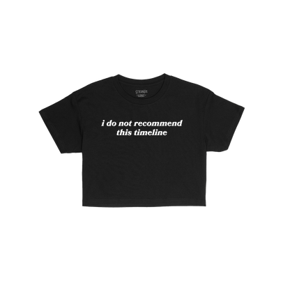 Timeline Women's Baby Tee black cropped Y2K style with white text "i do not recommend this timeline" front print.